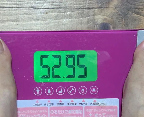 52.95kg