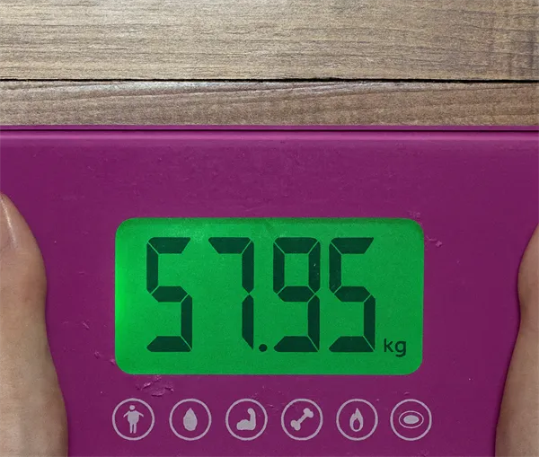 57.95kg